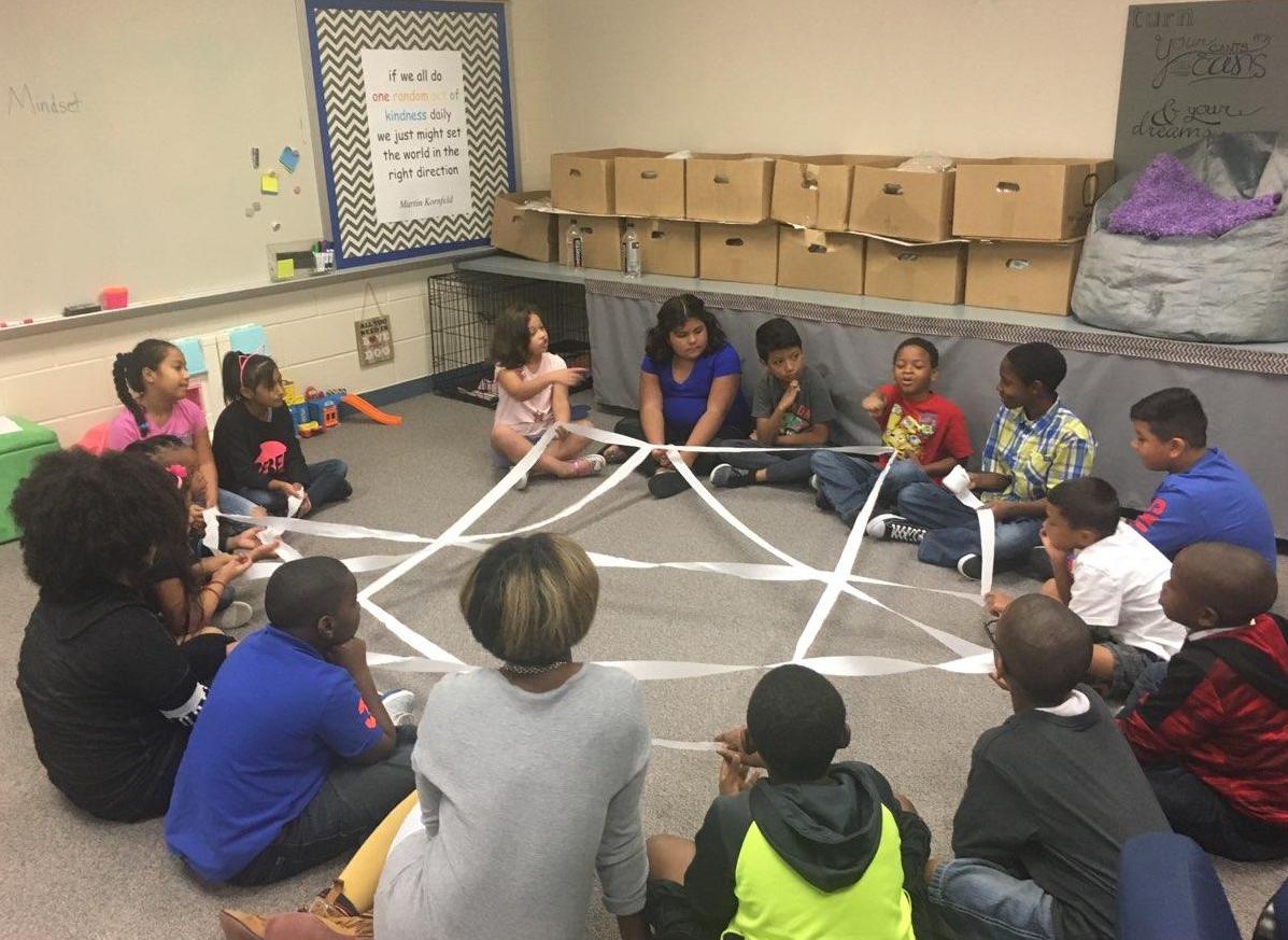 Students at Humble ISD near Houston toss a roll of toilet paper around their classroom to demonstrate how intelligence grows when the brain creates new connections. 