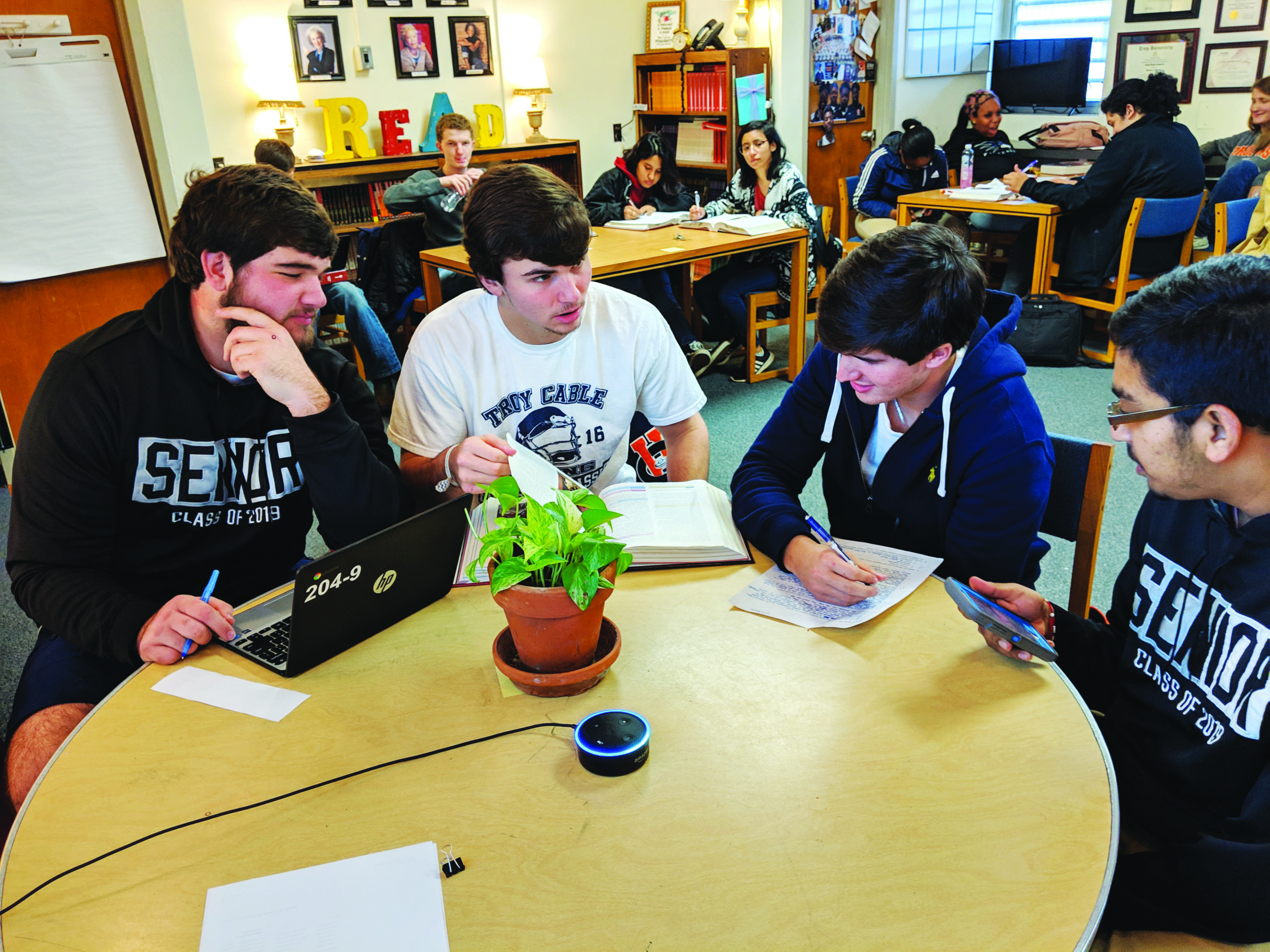 EDTECH EXPERIMENT—Students at Troy City Schools work with one of voice-activated devices teachers are piloting.