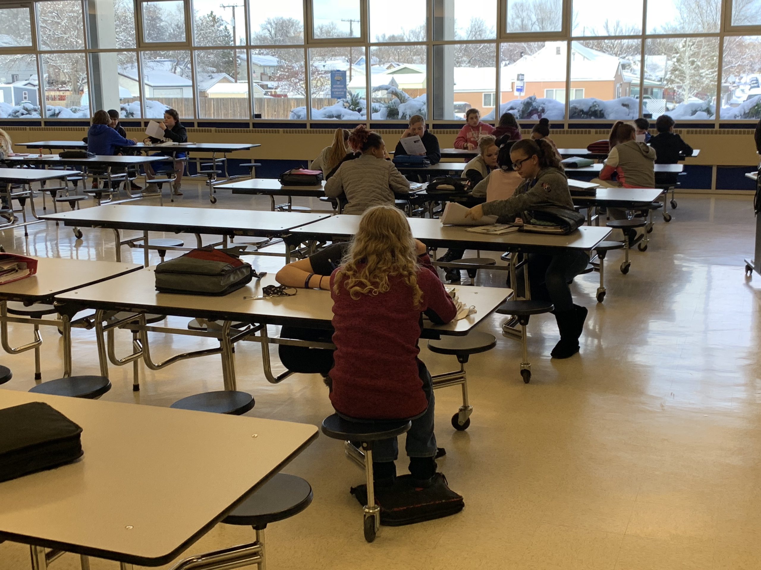 Riverside students working in the cafeteria study hall for WIN, which has improved student success.