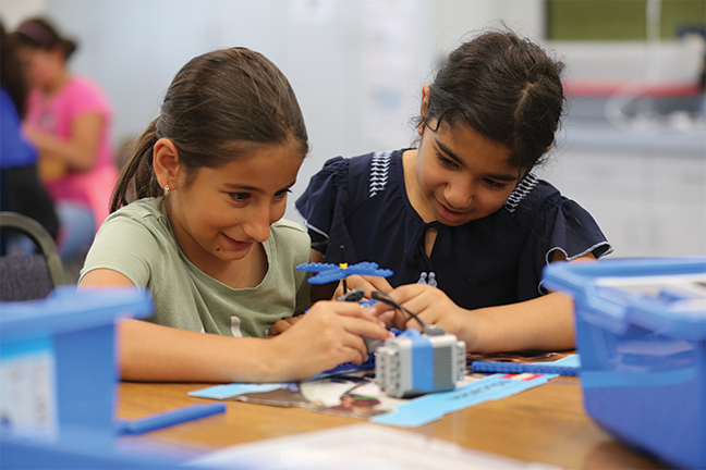 Students collaborate on a motorized Lego project at Anza Elementary in El Cajon, California. The San Diego County Office of Education has been helping district leaders with assessment strategies that move away from traditional tests.