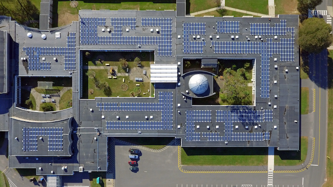 By tracking energy usage data, facilities staffers at Trumbull Public Schools in Connecticut increased efficiency and found funds for bigger money-saving capital projects, such as this solar array atop a smart school building, Hillcrest Middle School.