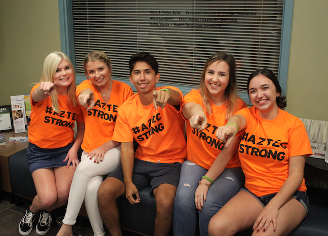 Student-led #AztecStrong student suicide awareness teams have formed at several schools in Arizona’s Tempe Union High School District. The district also prints a suicide hotline number on ID badges.