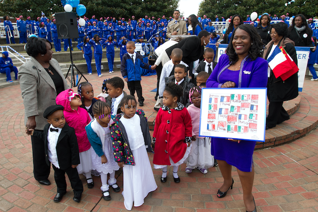 Tennessee State University President Brenda Baskin Glover celebrates learning with some young students.