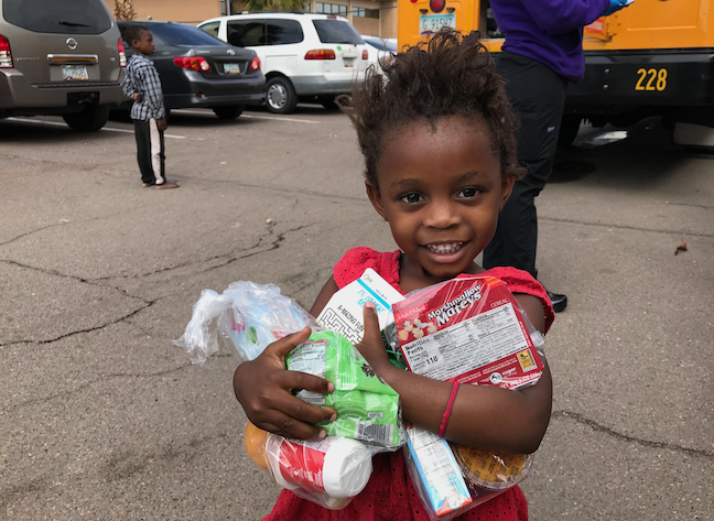 Students in Phoenix can pick up school lunch and breakfast from mobile kitchens placed on Alhambra Elementary School District buses. The buses park in locations that students can reach without crossing major streets or walking more than a mile.