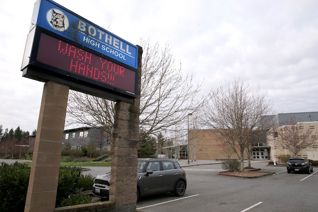 Coronavirus is forcing more school closures and shifts to online education on both coasts.