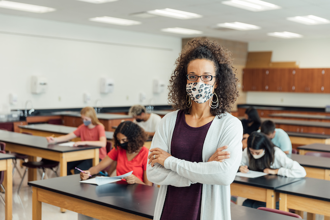 A key reason K-12 principals say they may leave their jobs is the political environment that swirled up around the COVIS pandemic. (GettyImages/RichVintage)