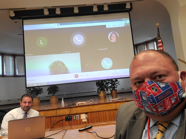 Meriden Public Schools Superintendent Mark Benigni (left) and Cheshire Public Schools Superintendent Jeffrey Solan temporarily swapped remote and in-person teachers to meet student demands in their neighboring Connecticut districts.