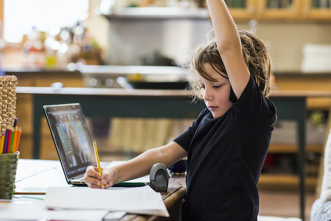 District leaders say they're maintaining attendance through new online tools and a renewed commitment to family outreach. (GettyImages/Mint Images)