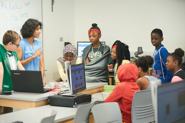 Le Moyne College runs a “quantitative thinking village” summer camps where Syracuse middle schoolers work on projects such as building robots and debugging computer programs.