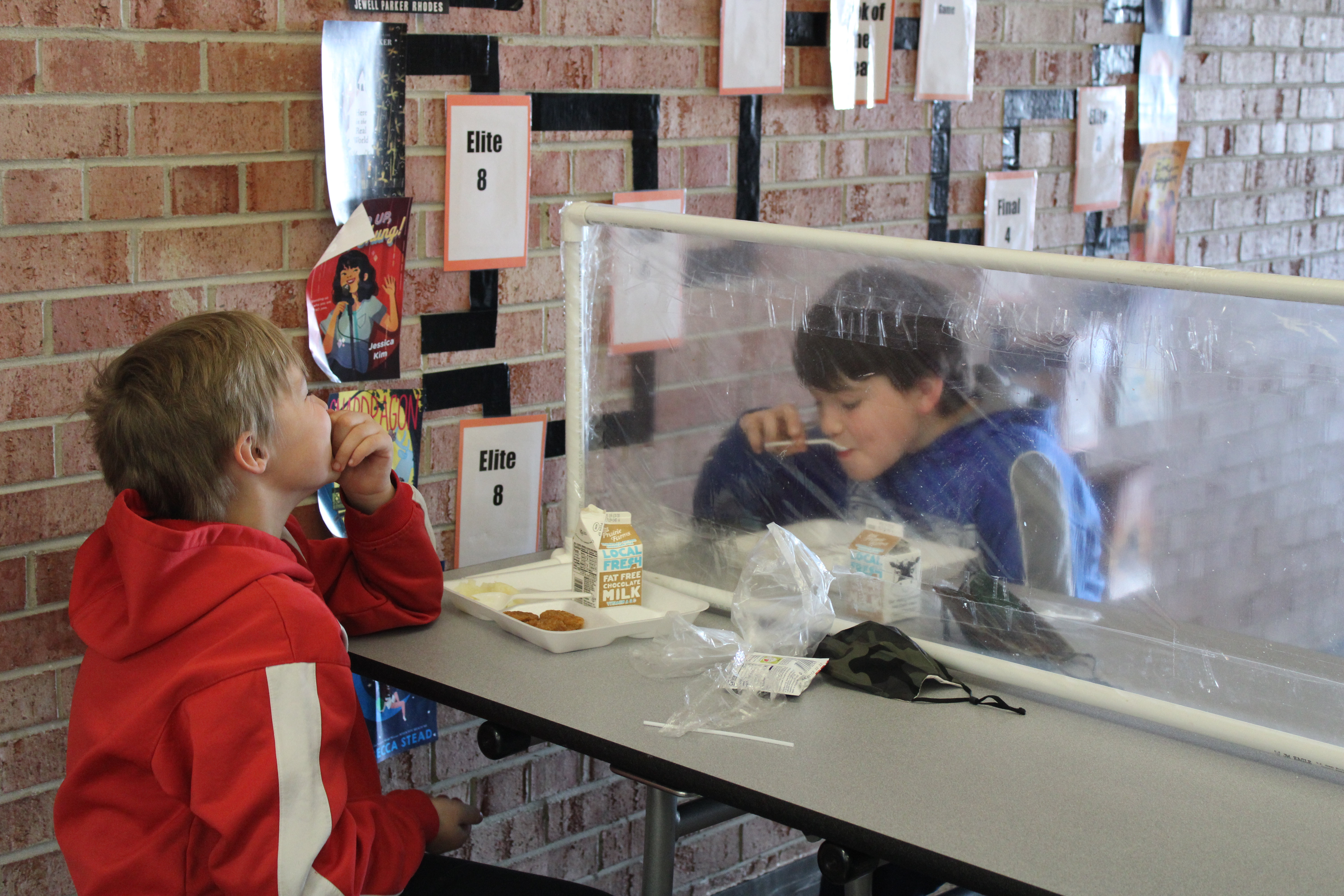 Students eat lunch, with COVID safety precautions, at the Parkview School District.