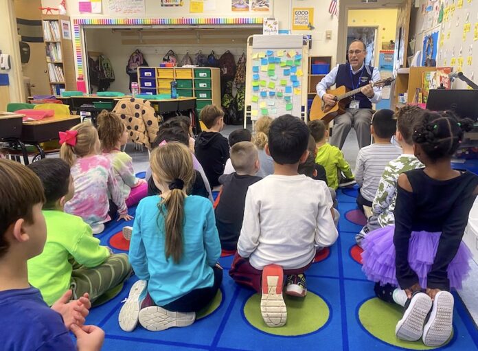 Superintendent Joe Famularo regularly performs for his students because he believes in 