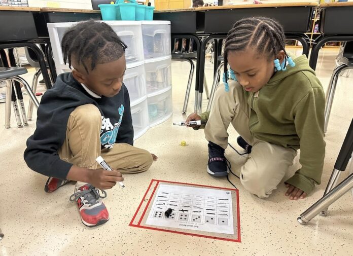 The buddy system at Juban Parc Elementary School in Louisiana pairs students to participate in monthly STEM, art and other learning activities.
